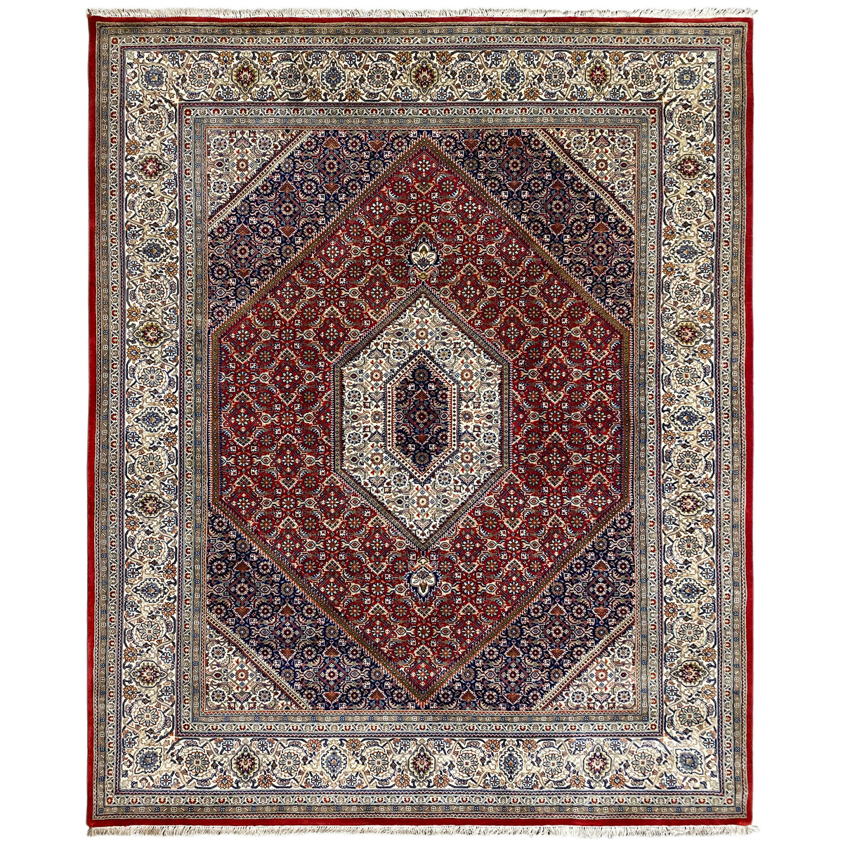 Bidjar rug with a red medallion and blue-and-white ornaments in the border frame