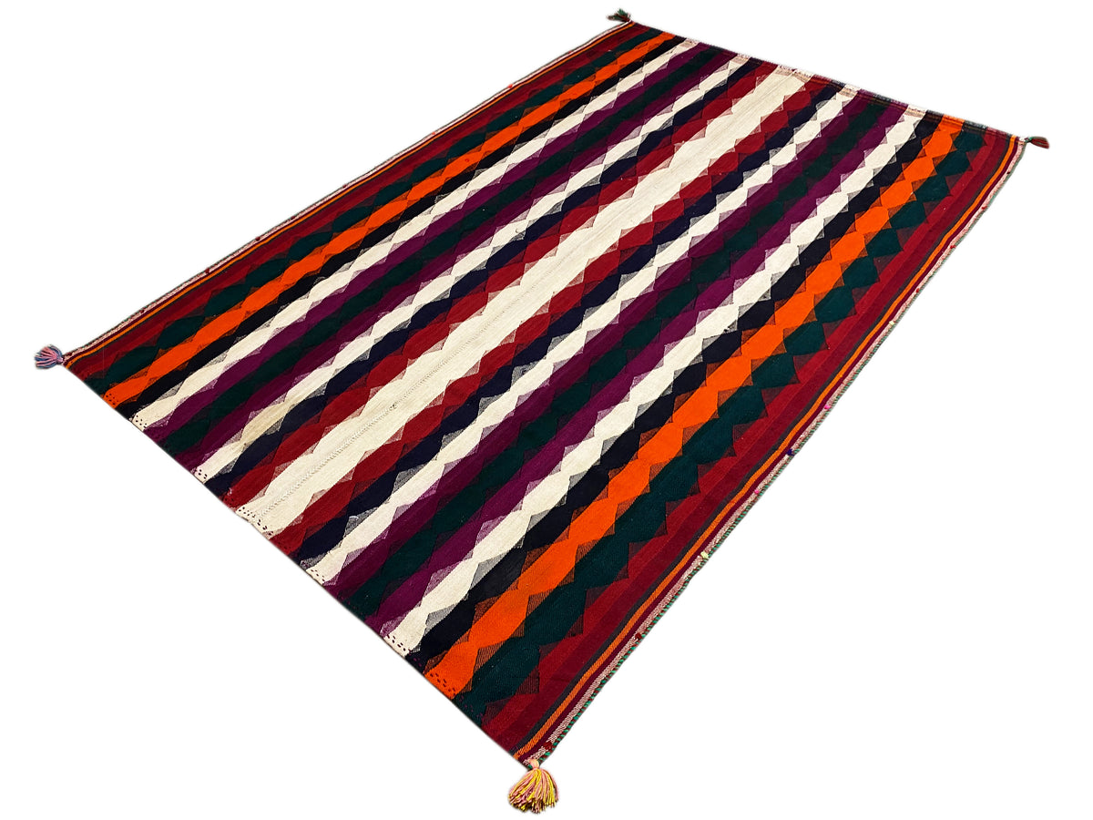 Colorful jajim rug with a diagonal stripe pattern in purple, orange, dark blue, and cream