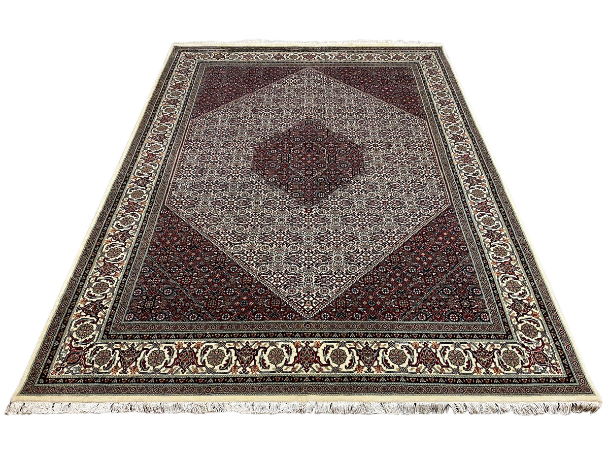 Bidjar carpet: rectangular design, central medallion, dark red and light beige color blocks