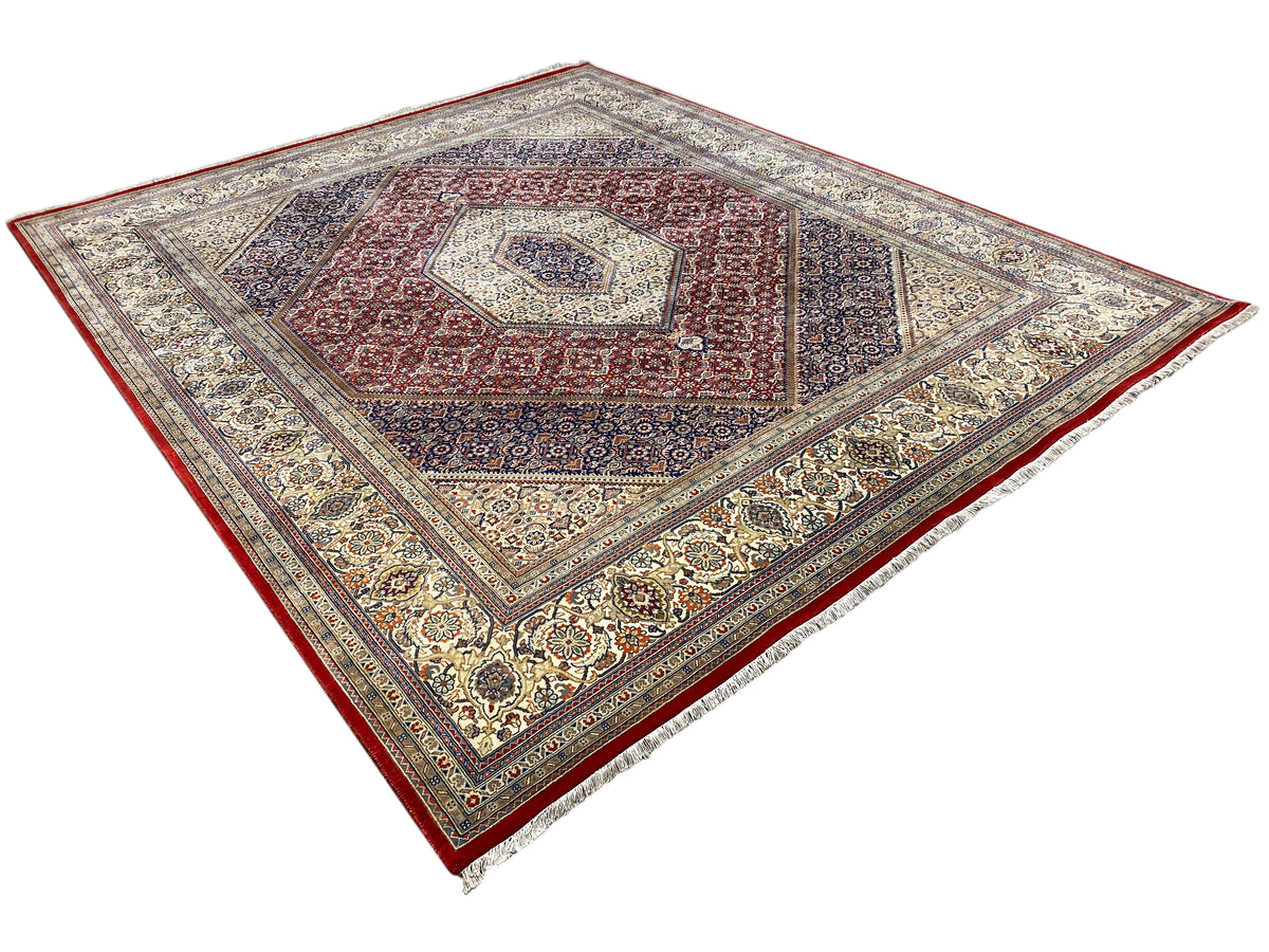 Bidjar rug with a central medallion, fine ornamentation in red, blue, and cream