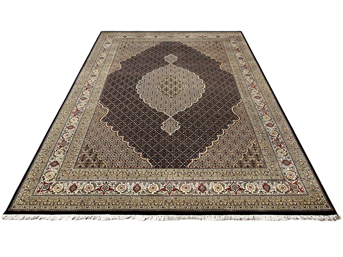 Rectangular rug with a brown background, medallion design, and fringe on the sides