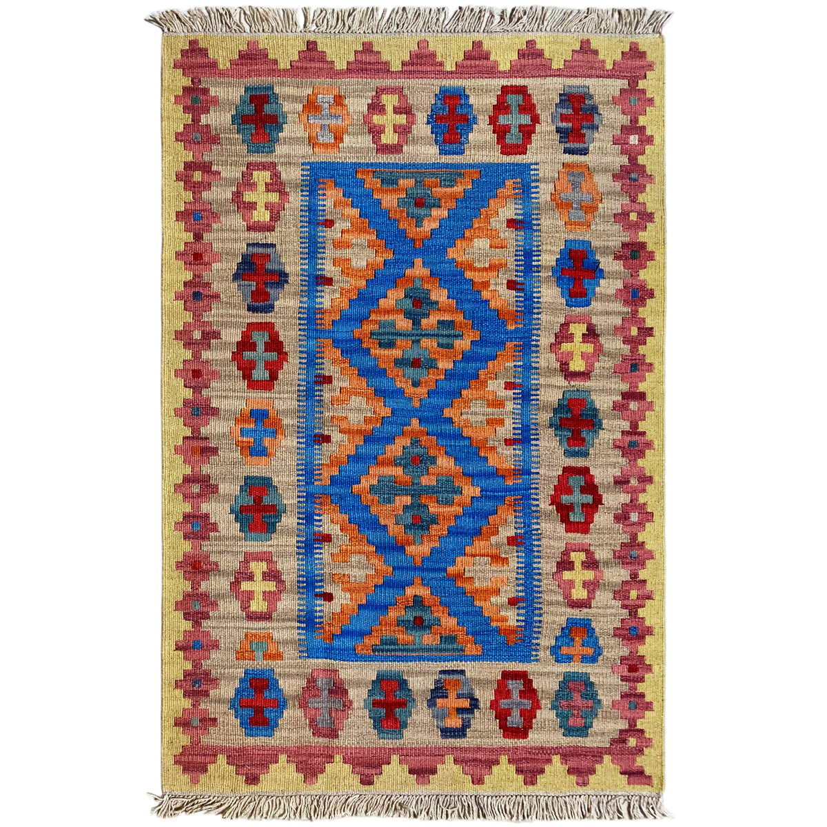 Beige kilim rug with a large blue-orange diamond pattern and crimson border pattern, fringes
