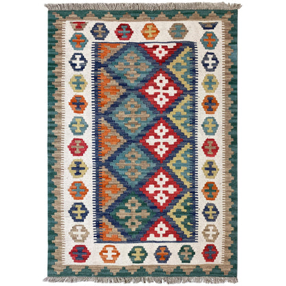 Kilim rug with a wide ornamental border, central diamond field, and fringes