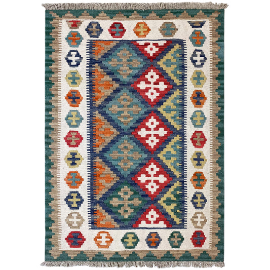 Kilim rug with a wide ornamental border, central diamond field, and fringes