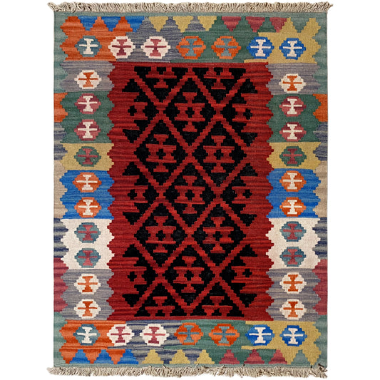 Kilim rug with a broad central black-on-red pattern, decorative stripes, and fringes