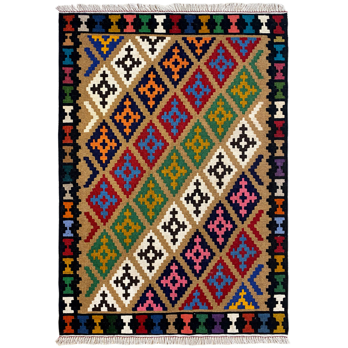 Kilim rug with a diamond and cross pattern in red, blue, green, and yellow, with fringes.