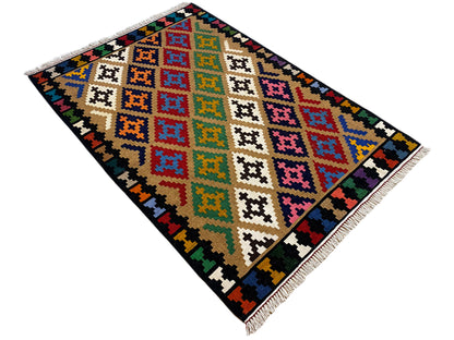 Kilim rug with a colorful geometric pattern, black border and fringe.