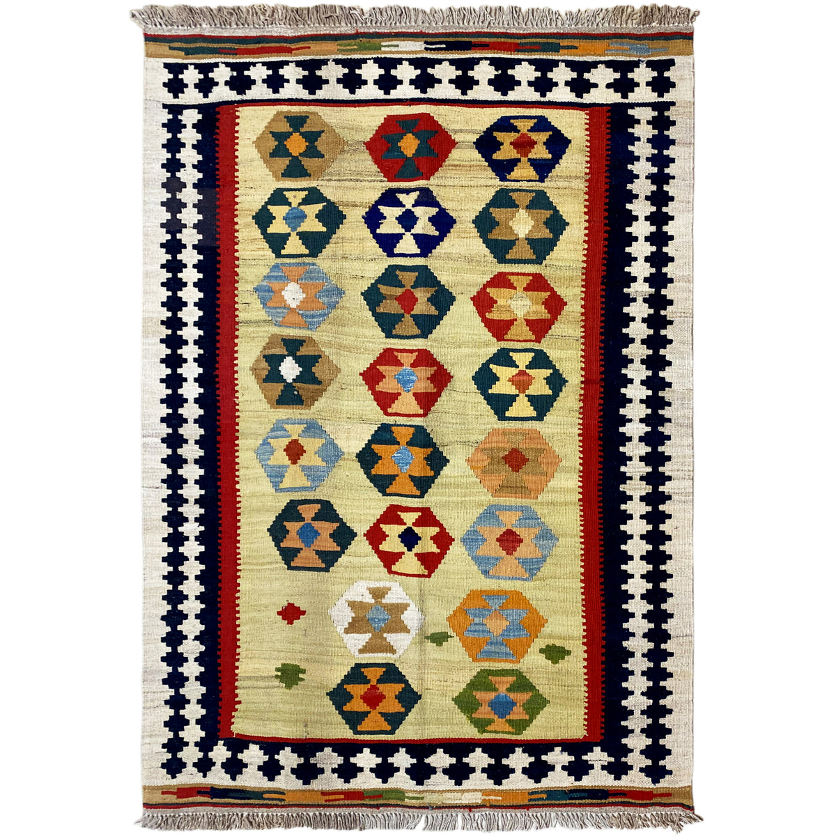 Beige kilim Qashqai rug with multicolored diamond pattern and fringes along the bottom edge