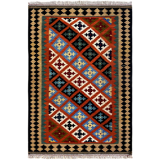 Kilim rug with a colorful diamond lattice pattern and dark border, fringes at the top and bottom