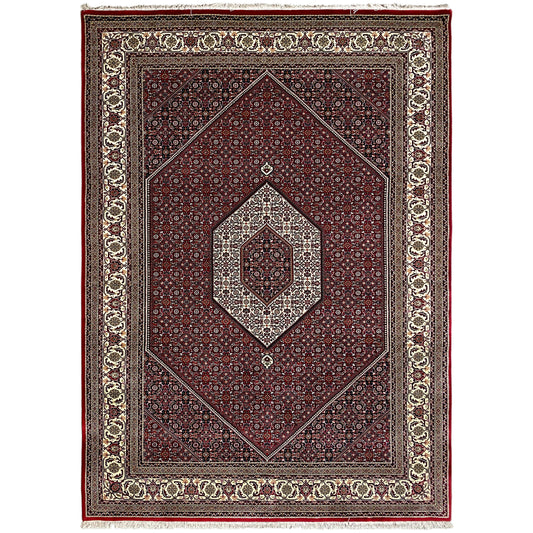 Bidjar rug with red field, beige corner frame, and central medallion