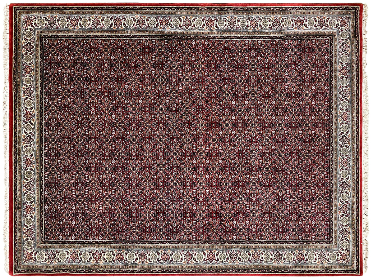 Bidjar rug from above: central field with dark red and black ornaments, border