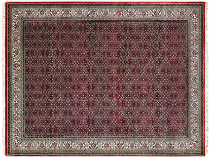 Bidjar rug from above: central field with dark red and black ornaments, border