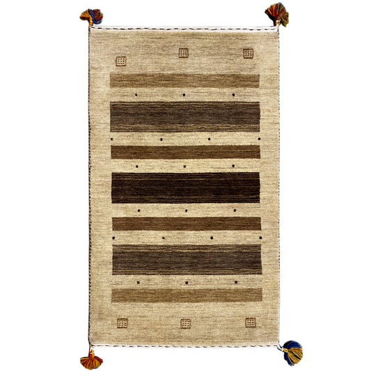 Gabbeh rug with a beige center, dark horizontal bars, and corner fringes