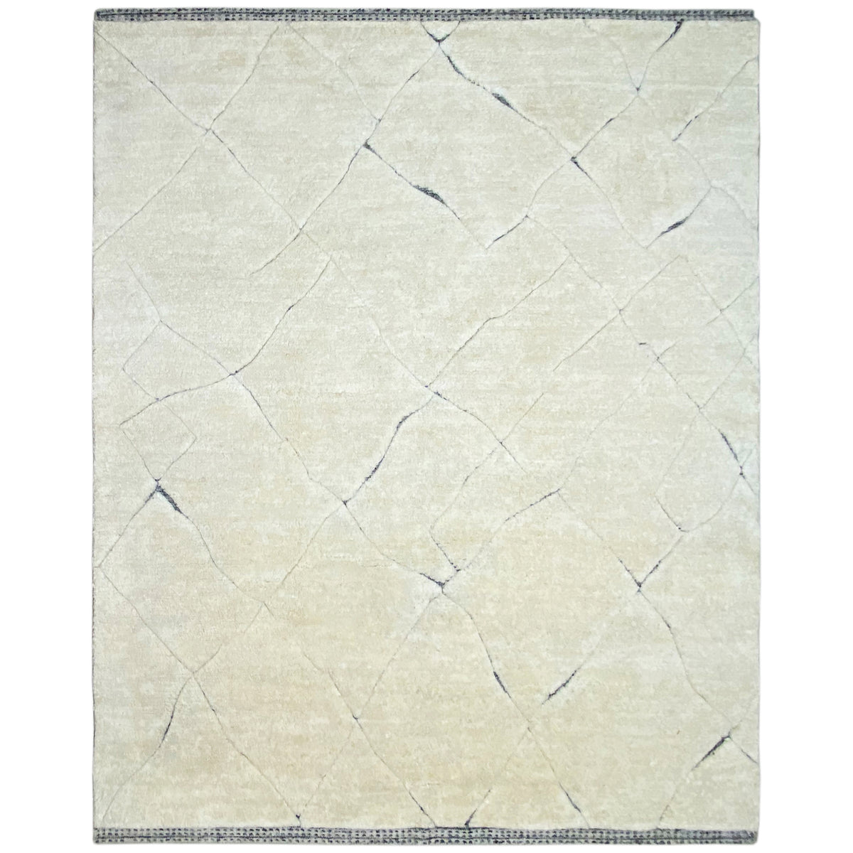 Berber rug with a light cream pile, blue lines, and a square border