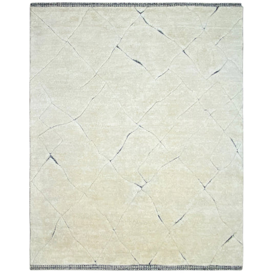 Berber rug with a light cream pile, blue lines, and a square border