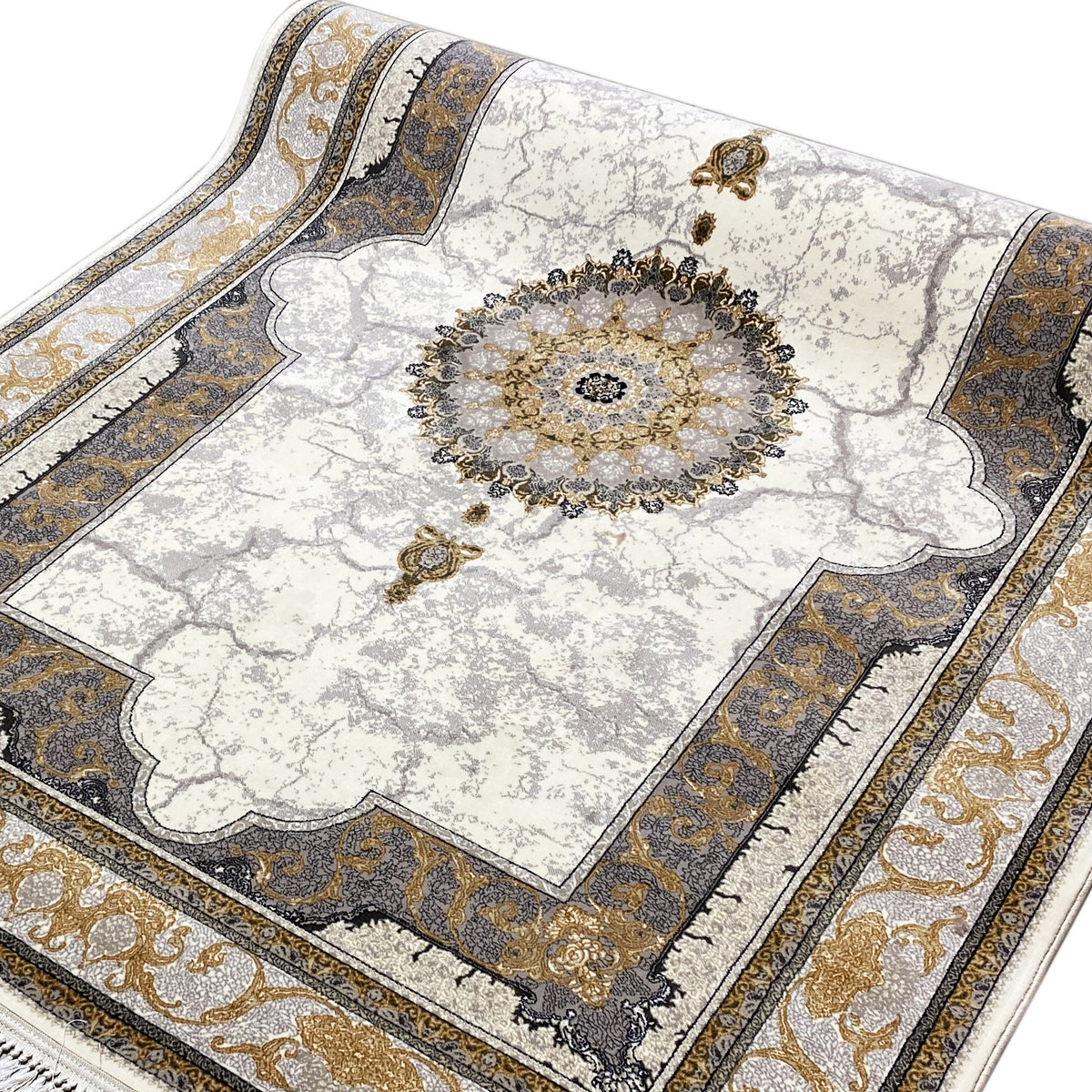 Detailed view of the rug: cream-colored field with a gold medallion, dark and gold borders.