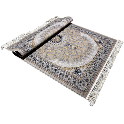 Medallion rug, rolled view; ornamental pattern in gray, gold, and dark blue