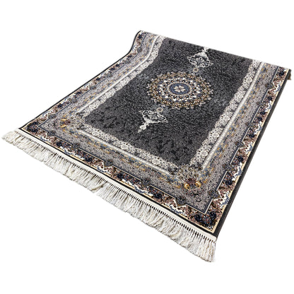 Black Oriental rug with narrow borders, a golden circular motif, and long fringes