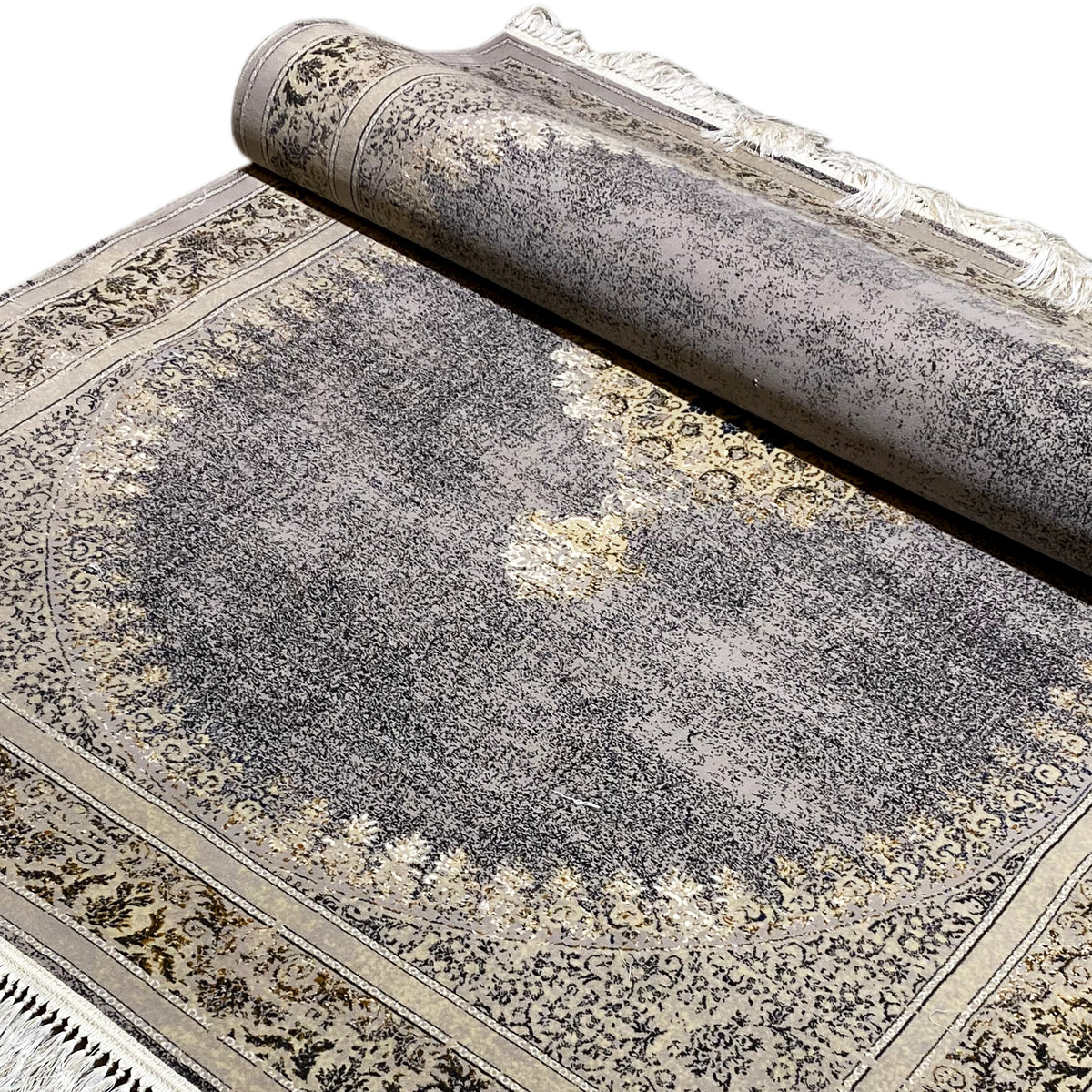 Medallion and border rug, mottled gray, gold patterns, fringed edges