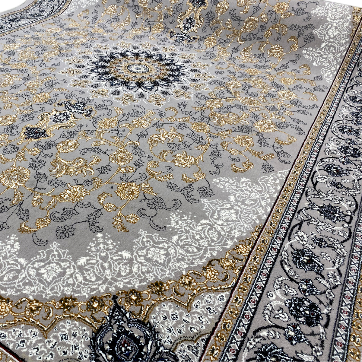 Close-up: ornamental border and floral pattern in gray, gold, and dark blue