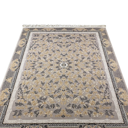 Front-facing rug with a medallion pattern, floral ornaments, a gray background, a decorative border, and fringes