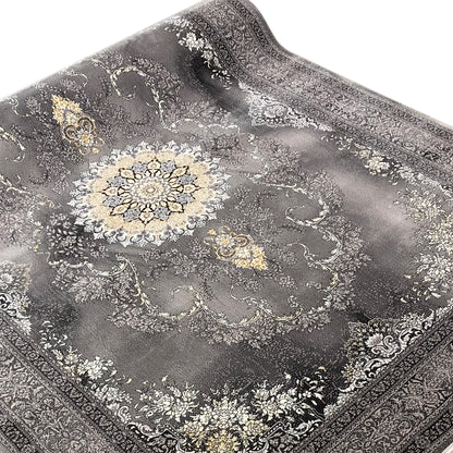 Kashan rug with a medallion pattern in gray, gold, and white accents, as well as a decorative border