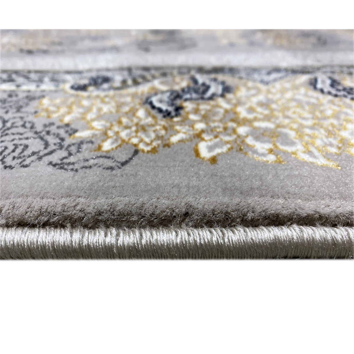 Medallion rug with a floral pattern, gray with gold accents, low pile