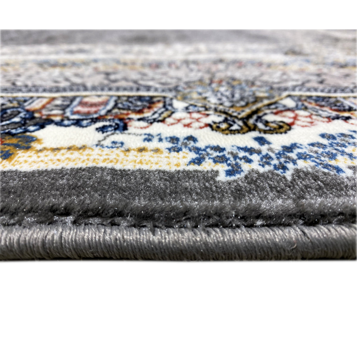 Oriental rug with an ornate border; dark pile and visible fringe