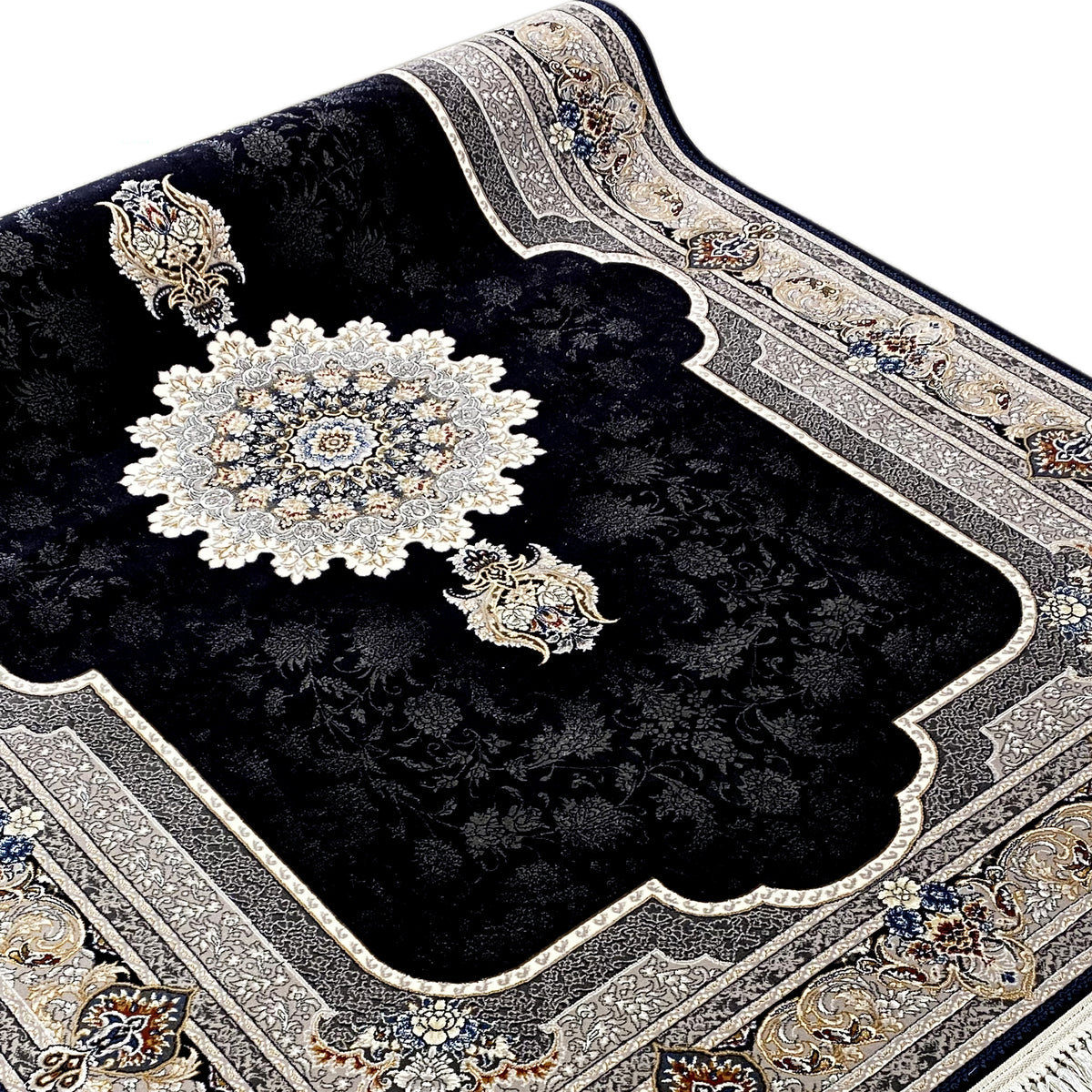 Rug at an angle: black pile with a centered medallion and cream-colored decorative border