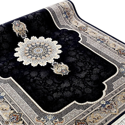 Rug at an angle: black pile with a centered medallion and cream-colored decorative border