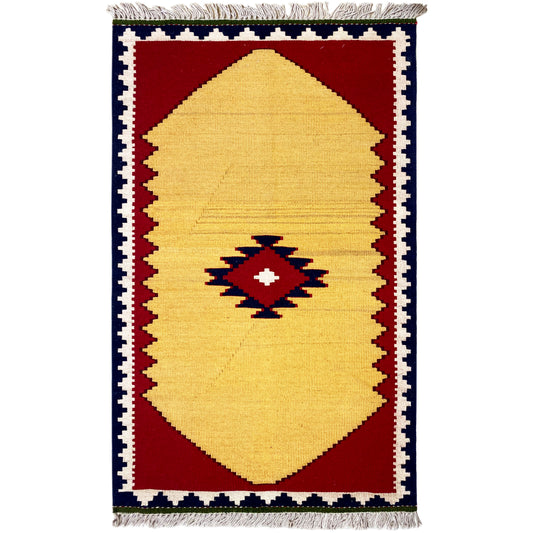 Kilim rug with a yellow central area and red floral/diamond motif, darkly framed