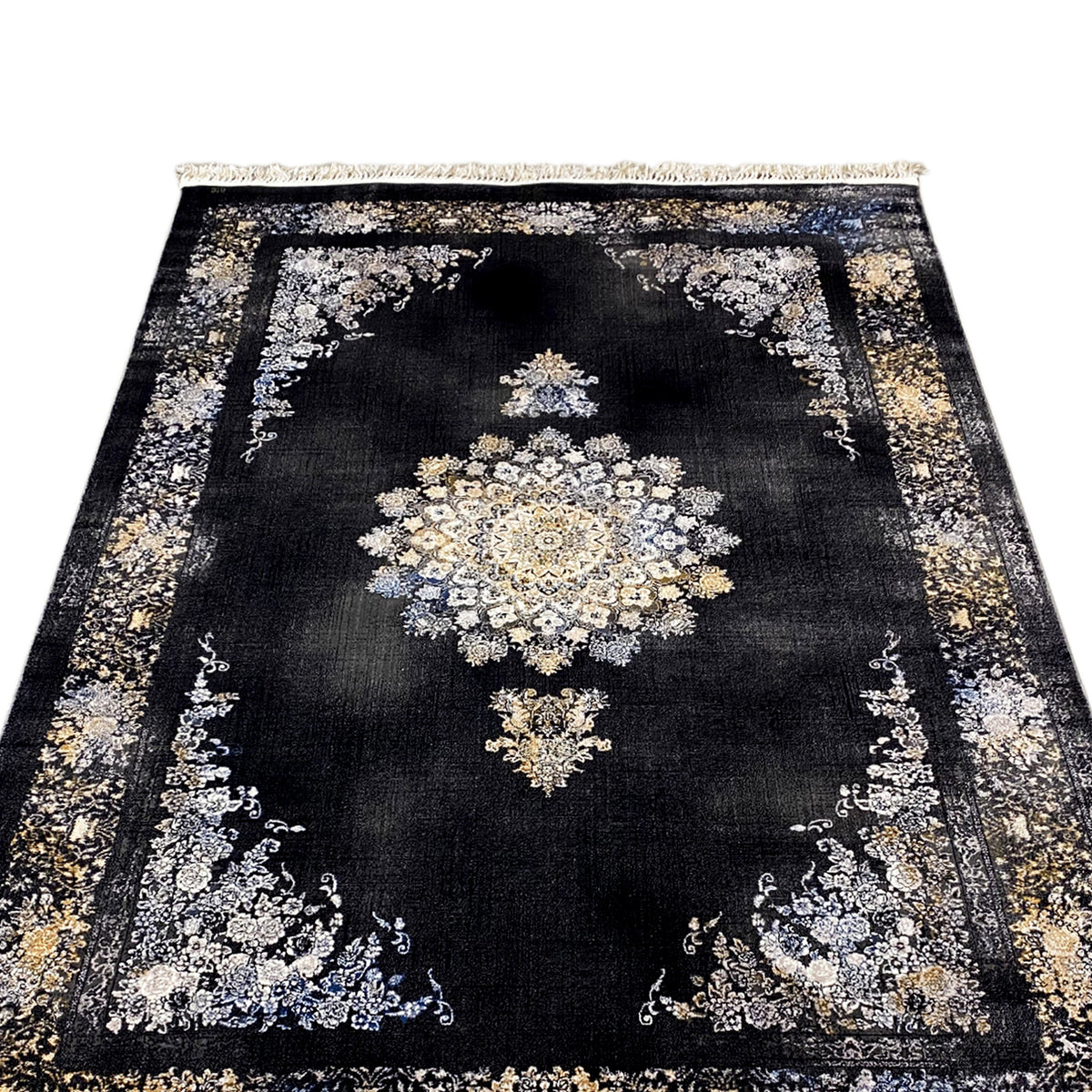 Rug with a dark background and central floral motif, gold and silver border