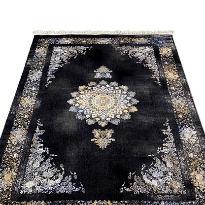 Rug with a dark background and central floral motif, gold and silver border