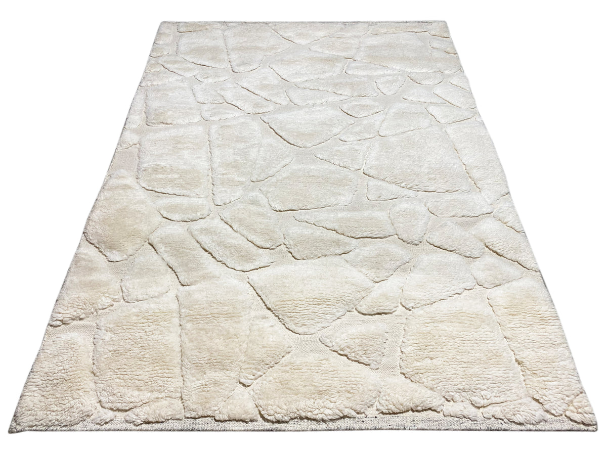 Berber rug 239x170 cm, light beige, photographed in a trapezoidal shape with a relief pattern