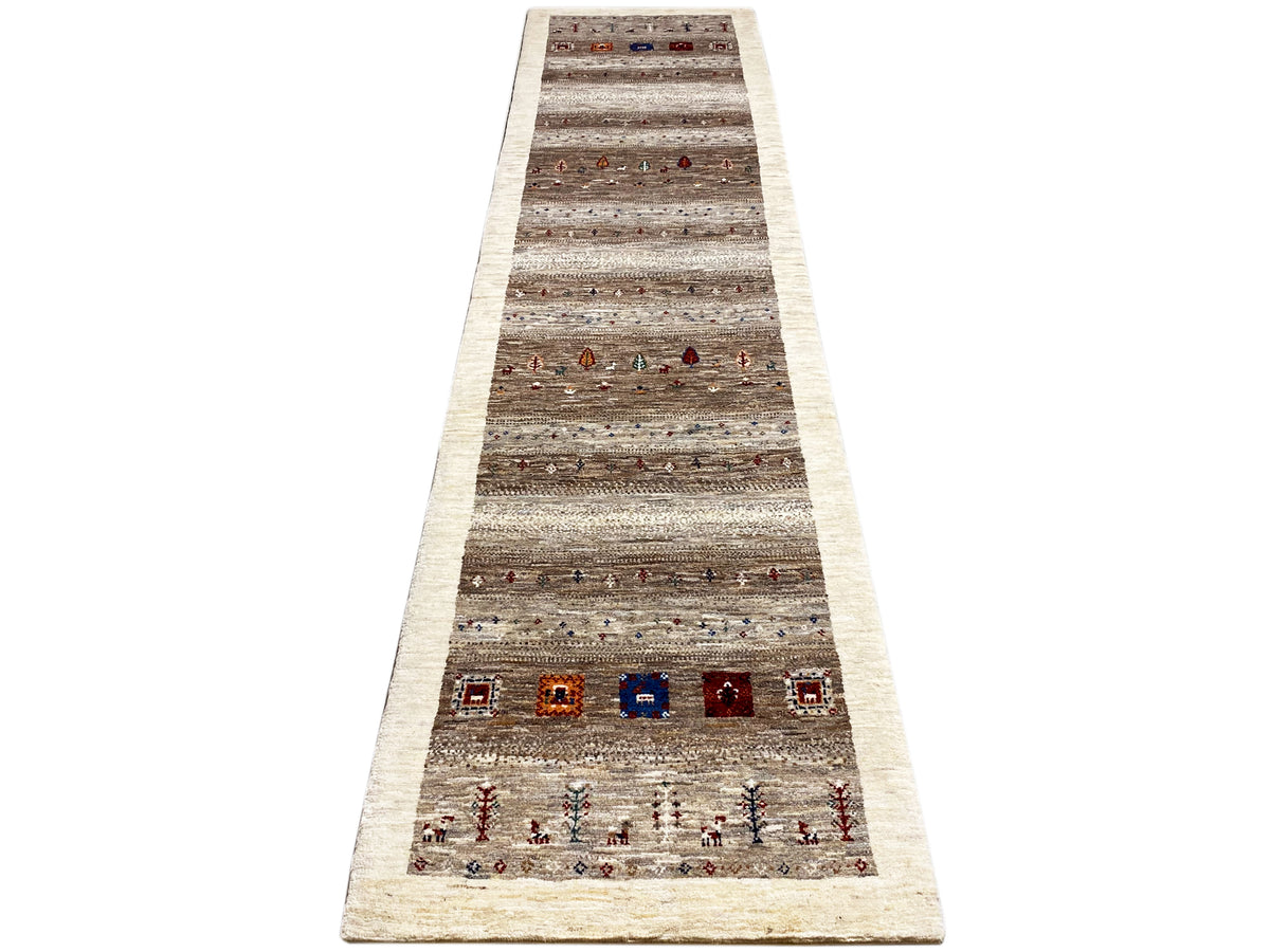 Gabbeh runner rug laid flat: brown-gray stripes, colorful small patterns, beige border