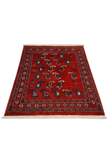 Rug 104x77 cm with a red background and blue medallion pattern, with fringes