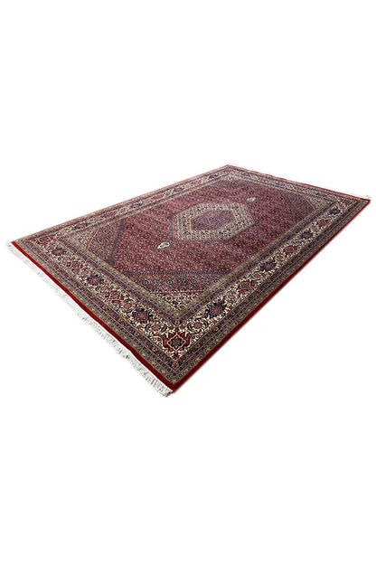 Bidjar rug 303x200 cm laid out, angled view, red geometric pattern