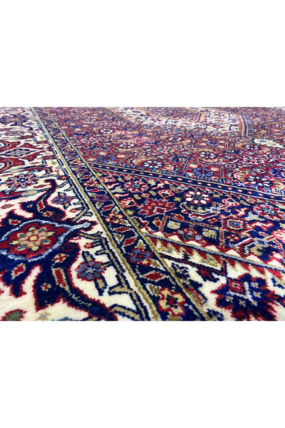 Bidjar rug with a blue-red pattern and white-cream ornamental borders