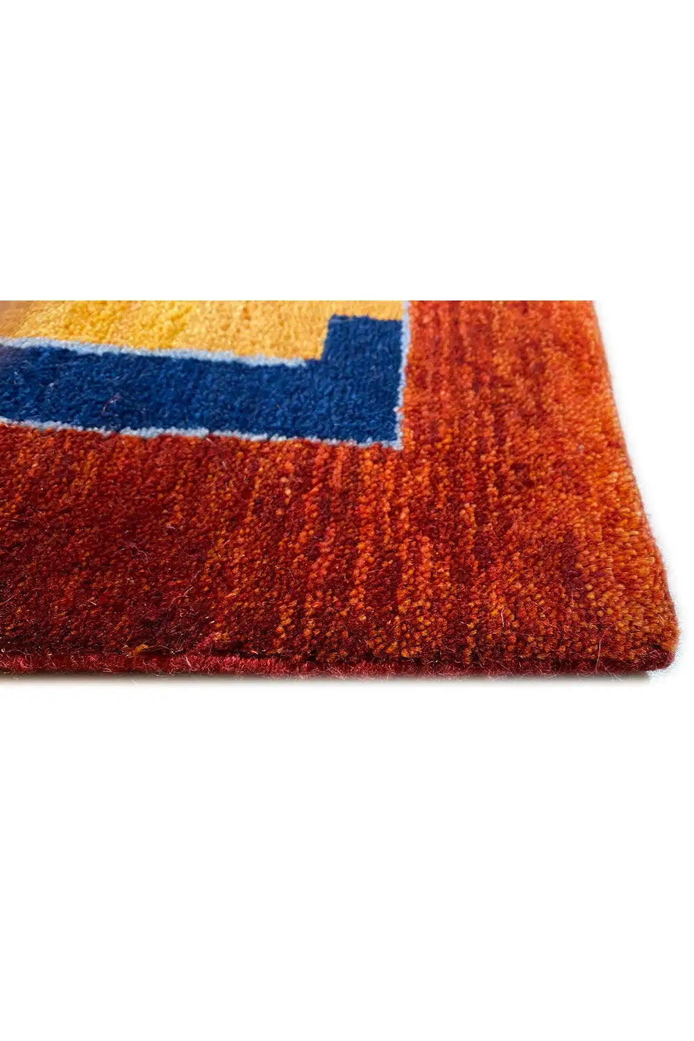Oriental rug with a reddish-brown border and orange-and-blue geometric pattern, visible pile texture