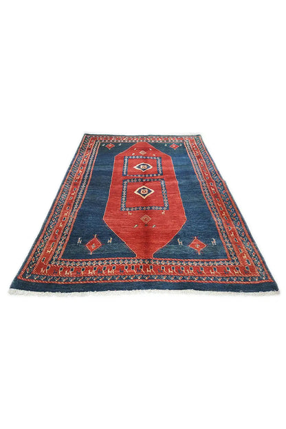 Oriental rug with a blue field, red central band, and decorative border