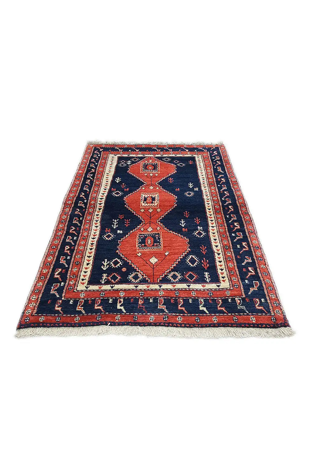 Rectangular rug with a blue background and red central motif, wide border