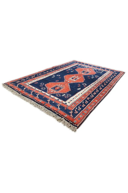 Rug, blue field with a red diamond/medallion pattern, rectangular