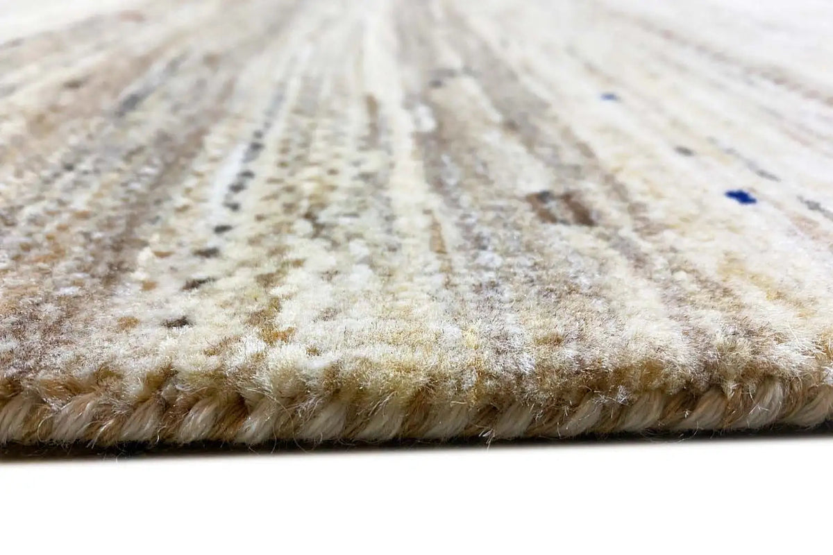 Gabbeh rug border with short pile; light tones and speckled lines