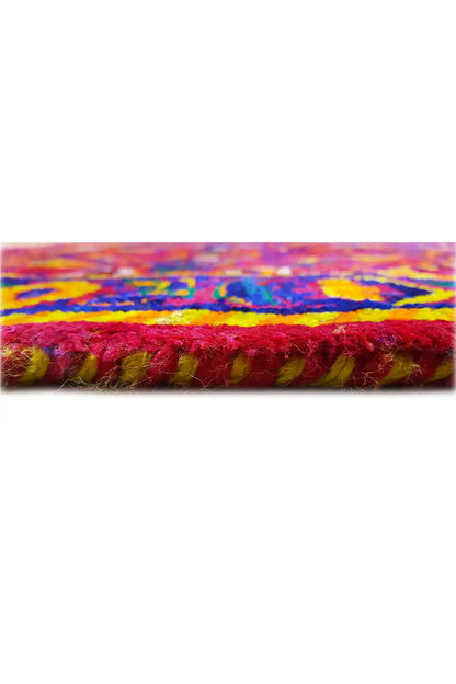 Close-up of a sari silk rug with fringes, multicolored pile and dense weave structure