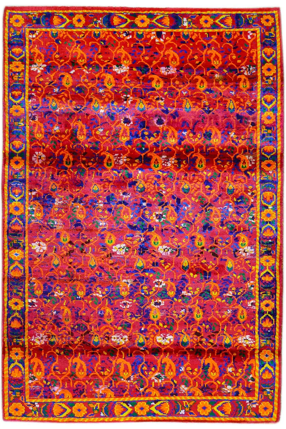 Silk sari rug with a vibrant pattern, red background, and blue-and-gold border