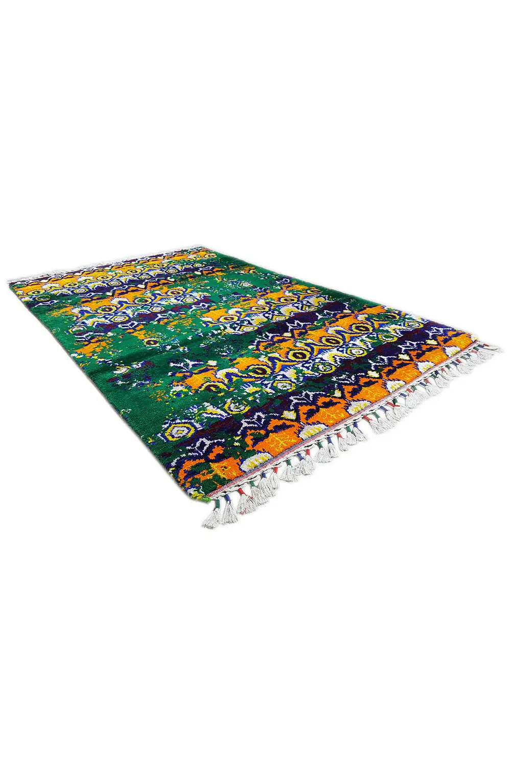Silk sari rug viewed diagonally with an ornamental pattern and fringes