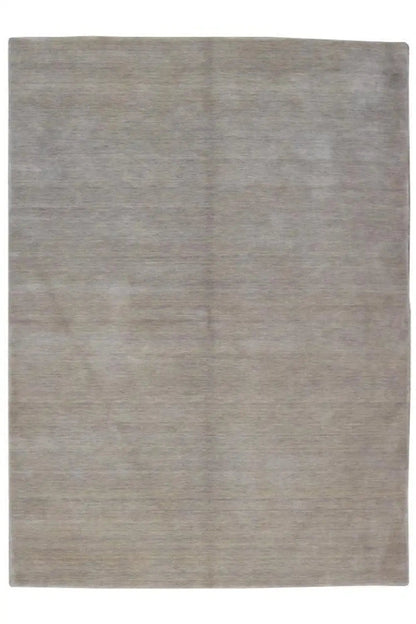Light gray rectangular rug with a simple look and straight edges