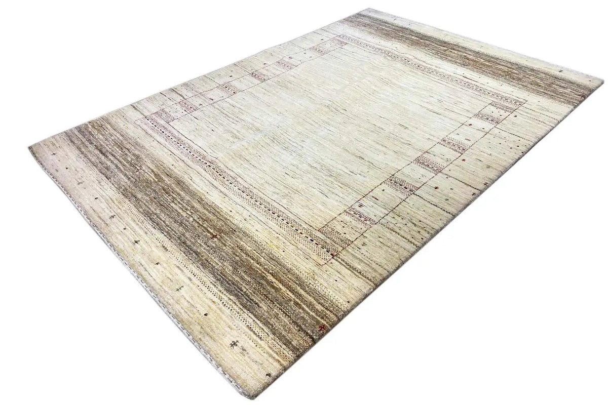 Gabbeh-Lori rug (207x140 cm), diagonal view, cream-colored look with decorative border