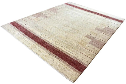 Gabbeh rug, diagonal beige pattern with a dark red border stripe