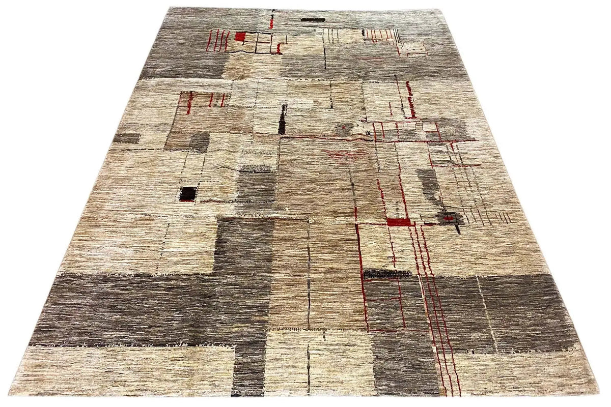 Gabbeh Lori rug with a geometric pattern, beige pile and red lines, angled